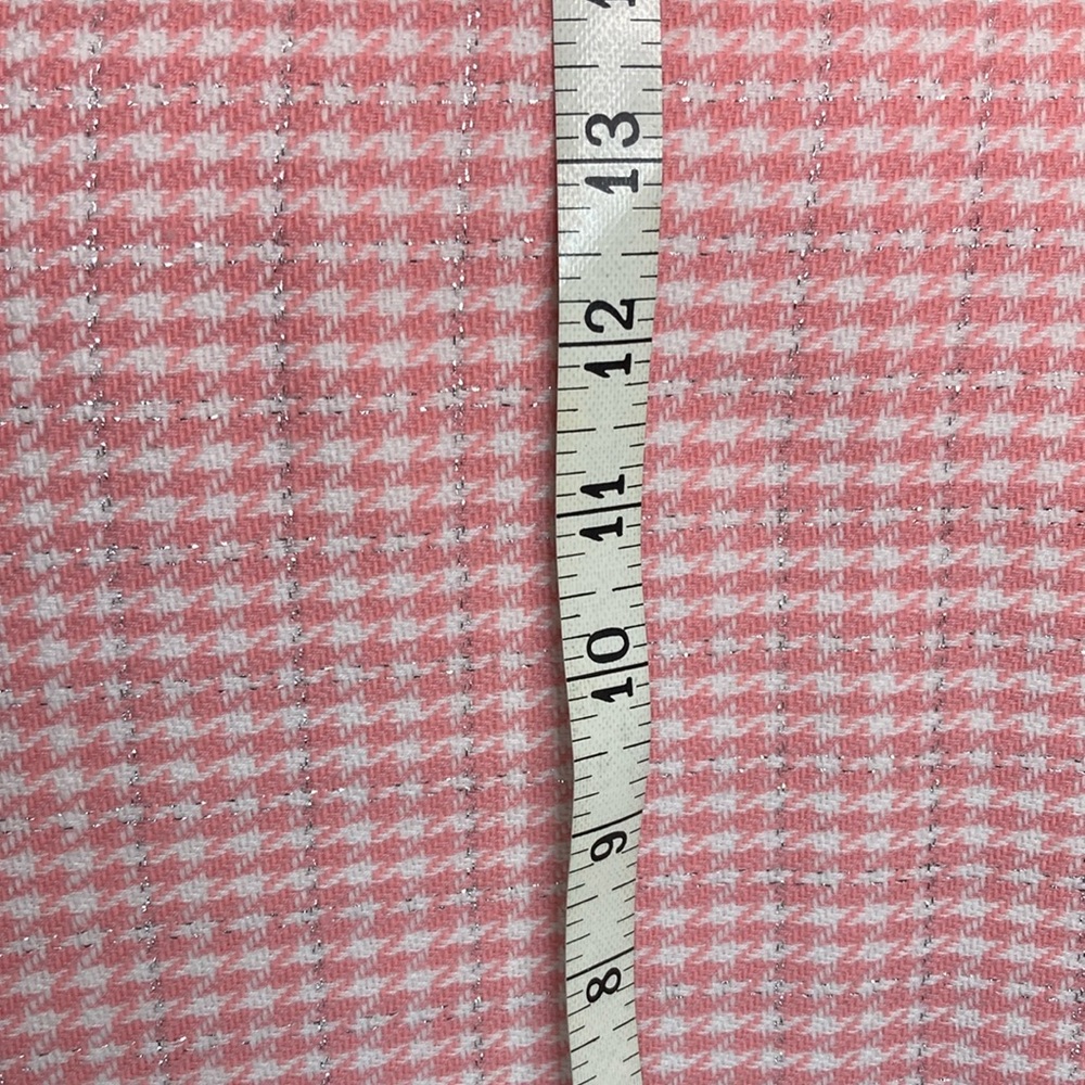 Vintage pink houndstooth with shiny silver accents. Very legally blonde 404